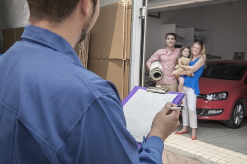 Experienced movers handling household items with care