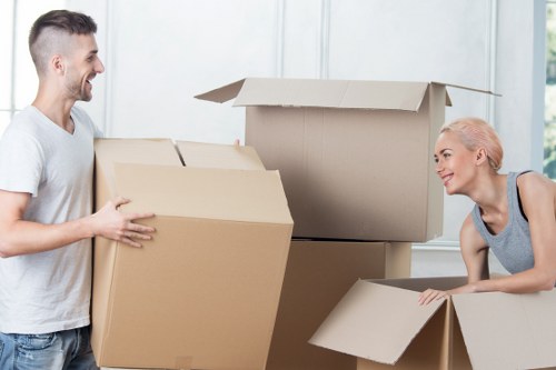 Kennington Removals experts efficiently organizing packed boxes